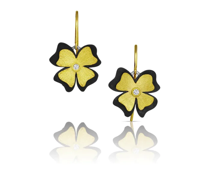 18k yellow gold and oxidized sterling silver flower earrings with diamonds, 0.04 cttw, on French wires. Earrings are 15/16" long and 5/8" wide (24 x 16 mm). 