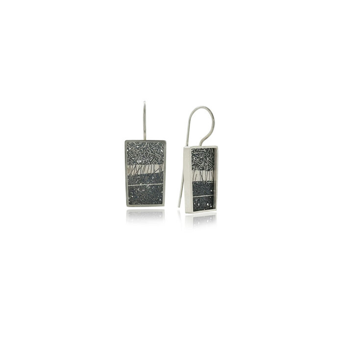 Medium drop frame earrings in sterling silver with hand fabricated oxidized silver mesh interior and an applied fine silver detail on stationary French wires. Earrings are 1 5/16" long x 1/2" wide (33 x 13mm).