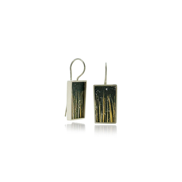 Medium drop frame earrings in sterling silver with hand fabricated oxidized silver mesh "blades of grass" in 3 shades of gold, on stationary French wires. Earrings are 1 1/4" long x 1/2" wide (32 x 12mm).