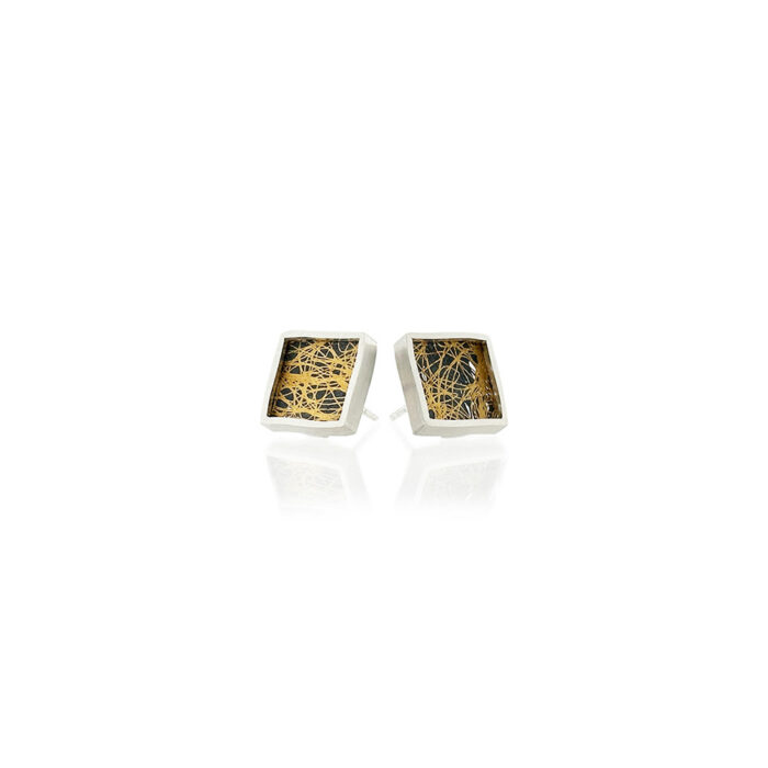 Small framed square studs in sterling silver and 24k yellow gold with hand fabricated oxidized silver mesh. Earrings are 7/16" (12mm).