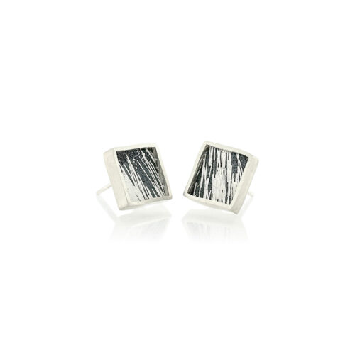 Small framed square studs in sterling silver with hand fabricated mesh in oxidized silver and gold. Earrings are 7/16" (12mm).