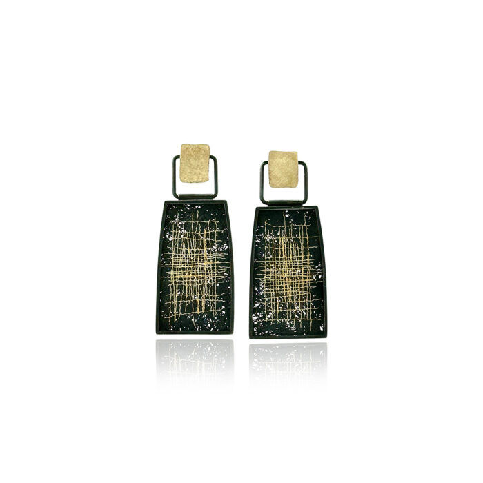 Hinged drop framed earrings in oxidized sterling silver with applied 18k yellow gold detail with studs with post backs, and hand fabricated mesh in oxidized silver and 24k yellow gold patchwork pattern. Earrings are 1 11/16" long x 11/16" wide.