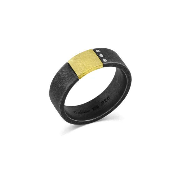 18 karat yellow gold and oxidized sterling silver flat surface ring with diamonds, .03 cttw, ring is a size 9.5 and the band is 7 mm wide. 