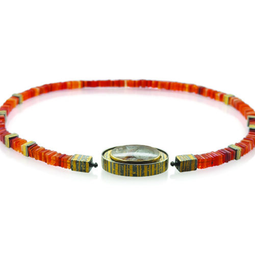 Quartz with pyrite sun disc, cut by Atelier Munsteiner, set in oxidized sterling silver with 22k & 24k gold, white (G) vs diamonds, 0.15cttw, Vario clasp, with a Mexican Fire Opal strand, 18.5grams, and spacer beads.