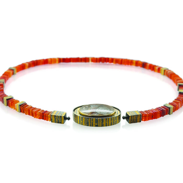 Quartz with pyrite sun disc, cut by Atelier Munsteiner, set in oxidized sterling silver with 22k & 24k gold, white (G) vs diamonds, 0.15cttw, Vario clasp, with a Mexican Fire Opal strand, 18.5grams, and spacer beads.