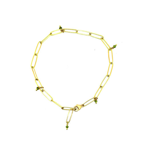 Adjustable popsicle bracelet in 18k yellow gold with green diamond beads and a lobster clasp.