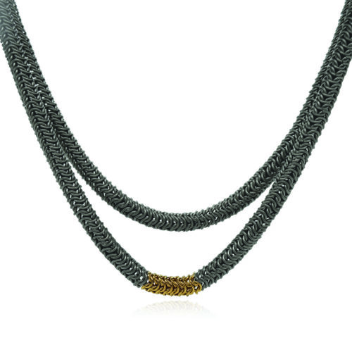Long titanium tube necklace with 18k yellow gold accent. Necklace is 40" long.