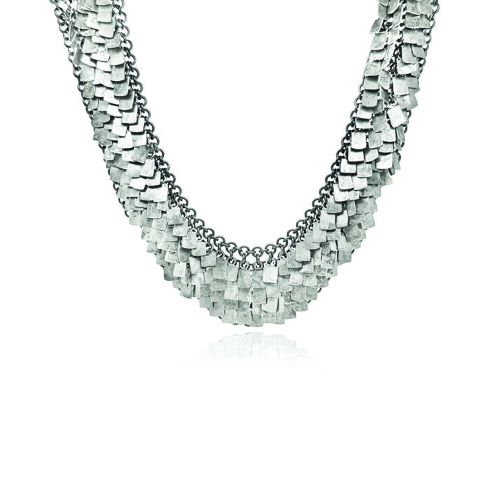 Sterling silver and titanium chainmaille shake necklace with toggle clasp. Necklace is 15" long x 1" wide. 