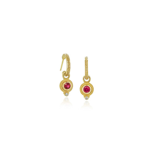 18k yellow gold granulated hoop earrings with removable ruby drops, 0.53 cttw, and two small round bottom diamonds, 0.04 cttw. Earrings are 1" long x 5/16" wide (25 x 8 mm).