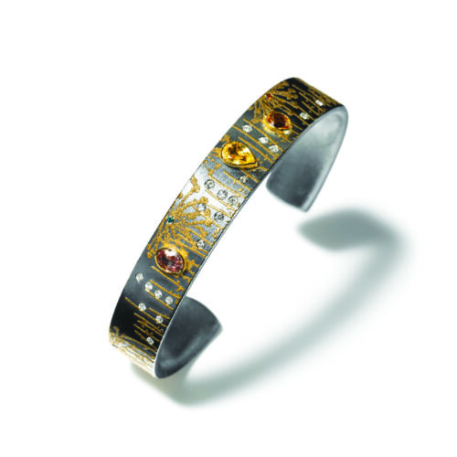 Narrow Dandelion cuff with sapphires, colored and white diamons