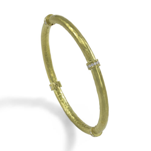 hollow constructed 18k gold bangle with diamonds