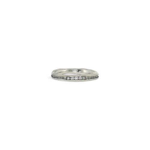 Irregular platinum channel ring with diamonds and blackened channel