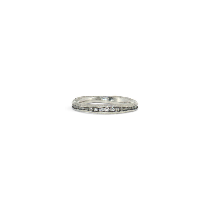Irregular platinum channel ring with diamonds and blackened channel